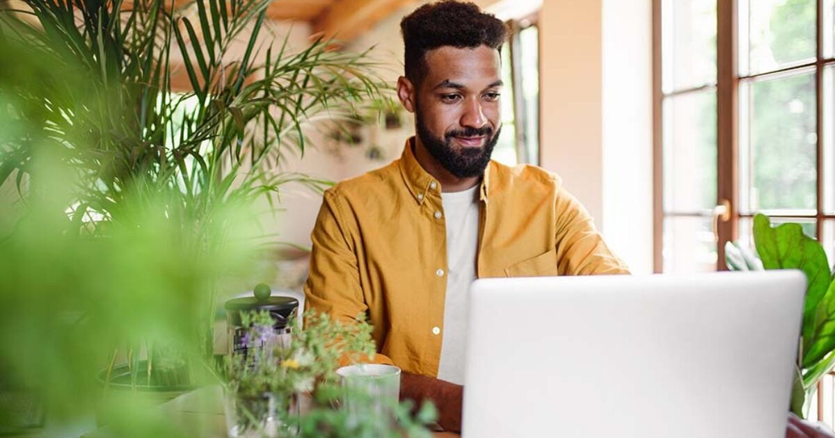 A guy working on his laptop