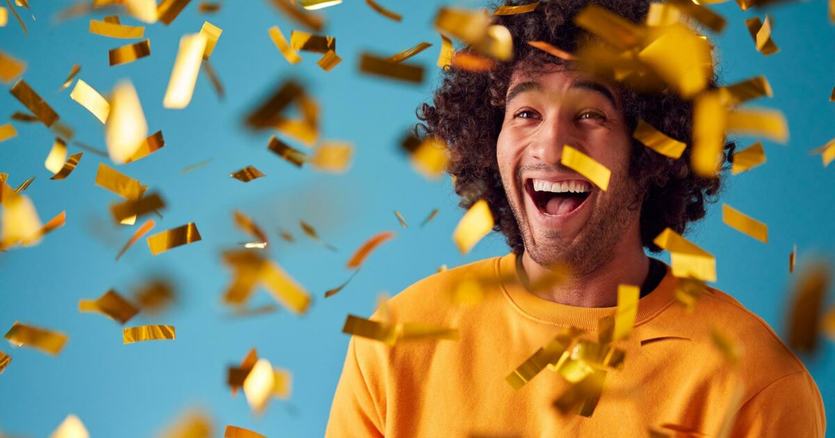 Confetti falling on a guys head