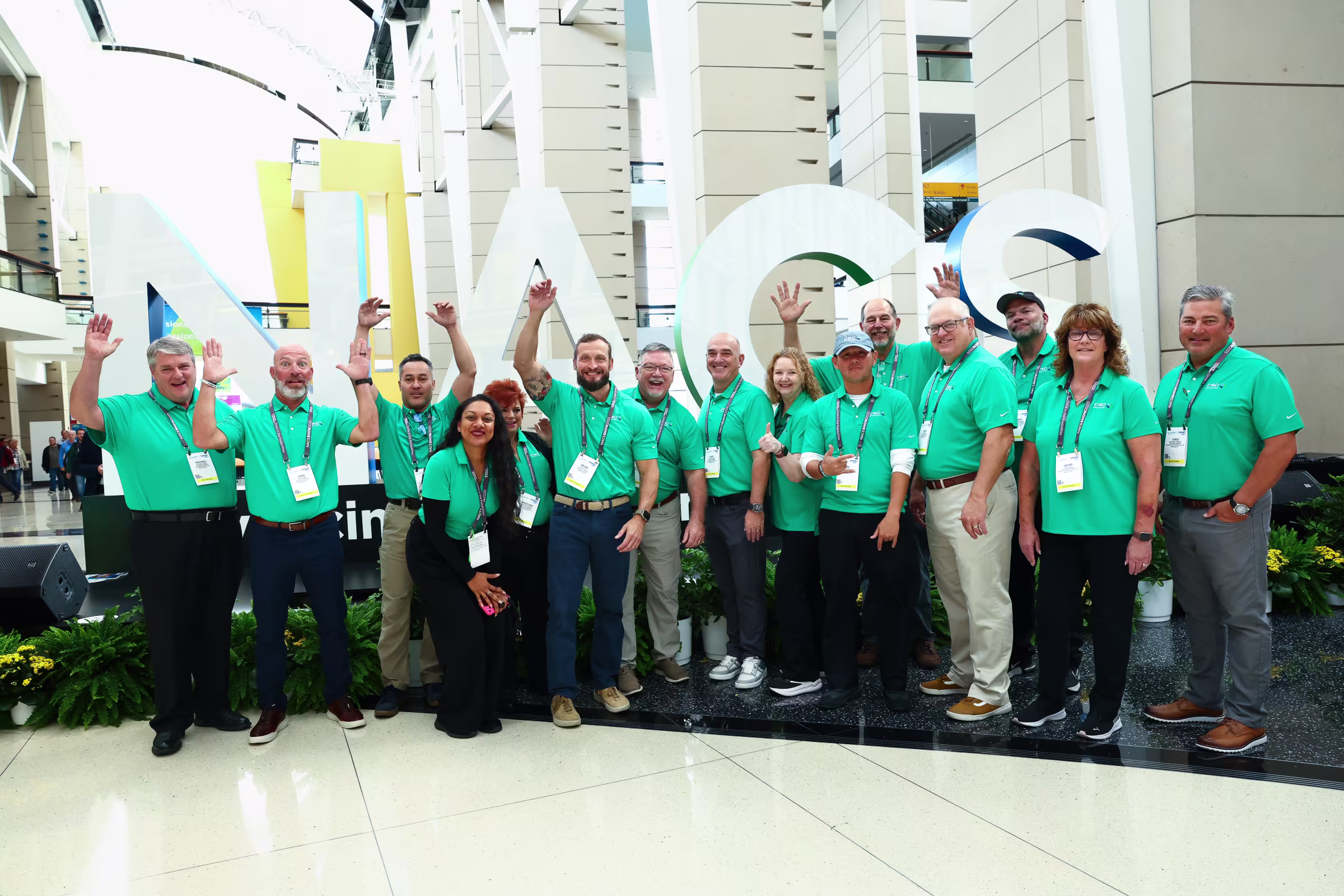 Uberall team celebrating together at the NACS Show