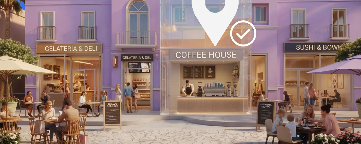 Street of restaurants and cafes with a verified location pin above a coffee house storefront