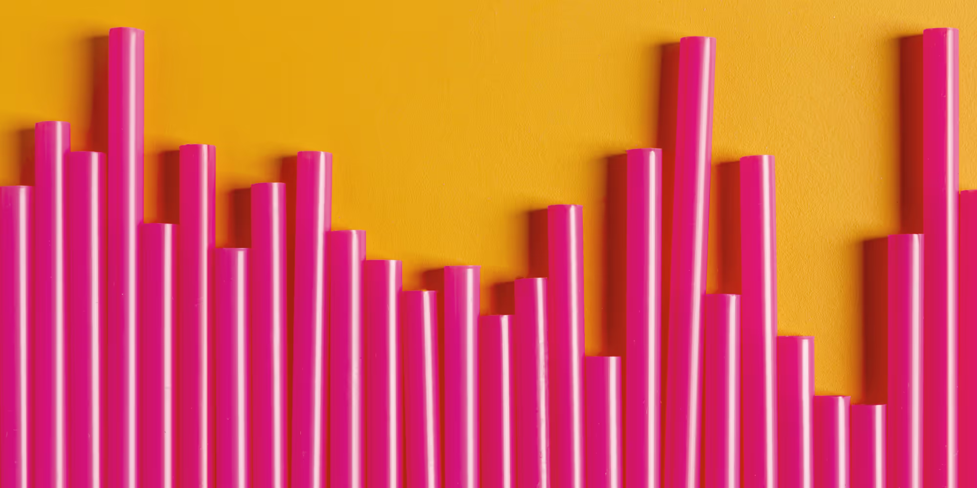 Pink straws making a bar chart