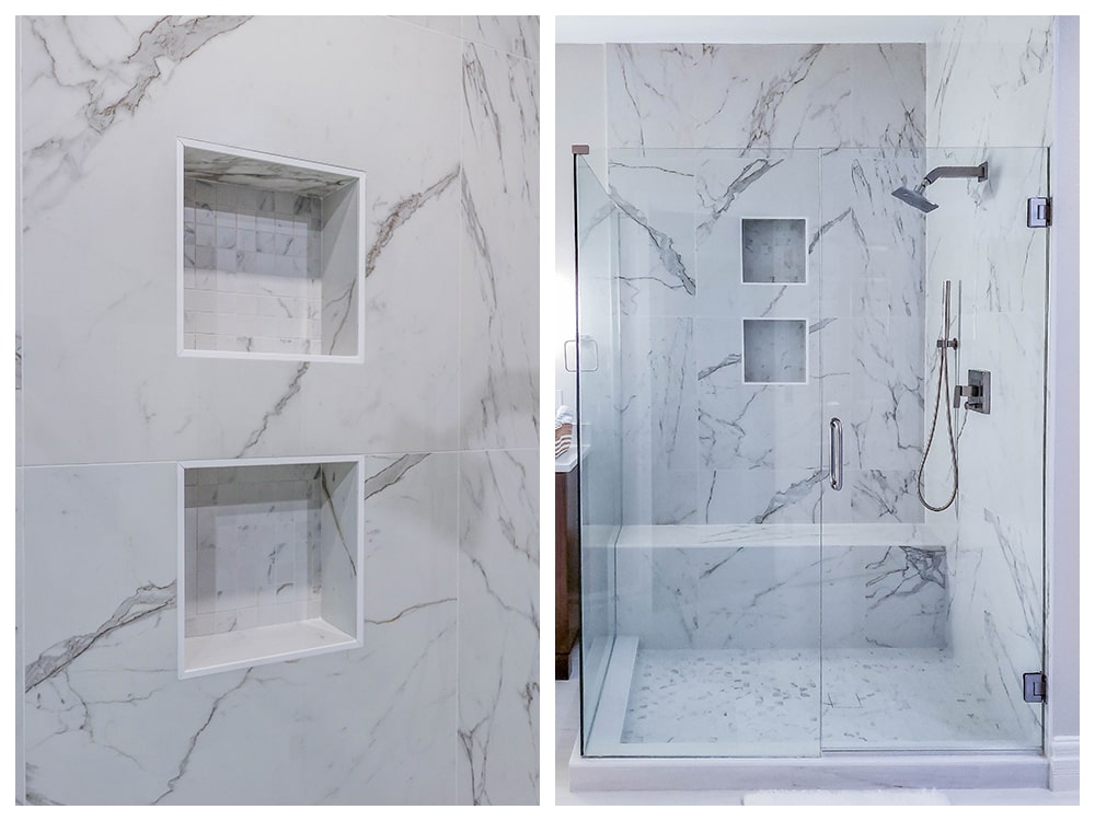 Modern walk-in shower with glass doors, white marble walls, built-in square niches, and chrome shower fixtures including a handheld and rainfall showerhead.