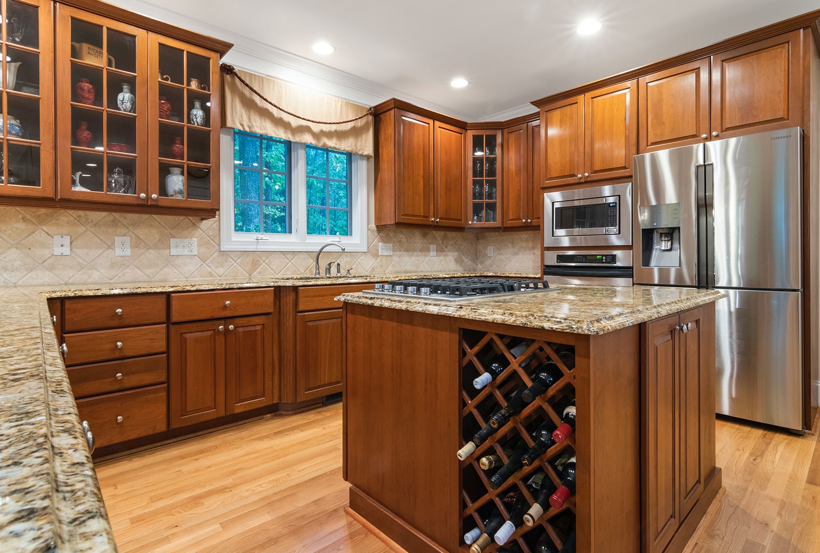 A wooden stain kitchen cabinets.