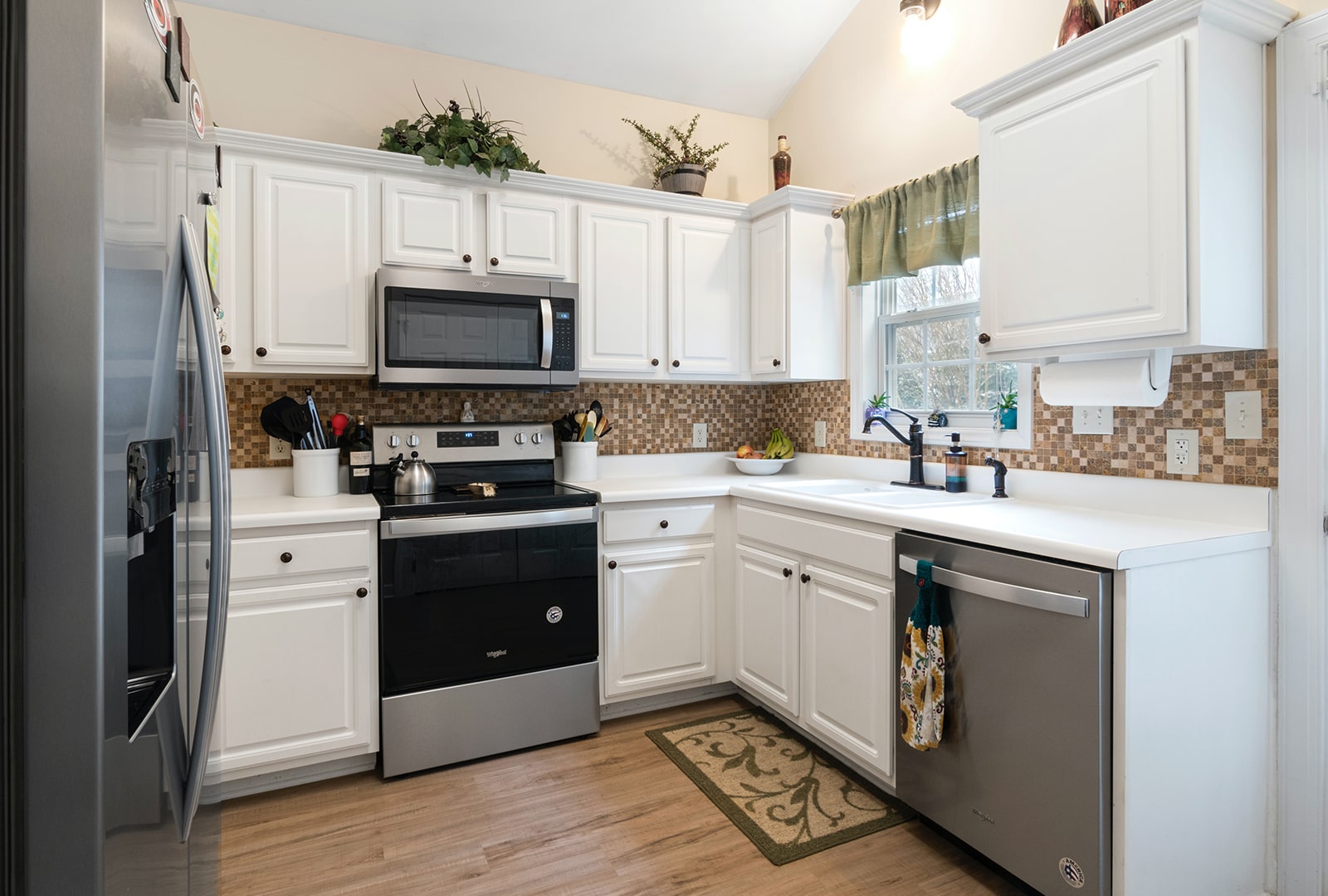 A chic styled kitchen inspired with french cabinets.