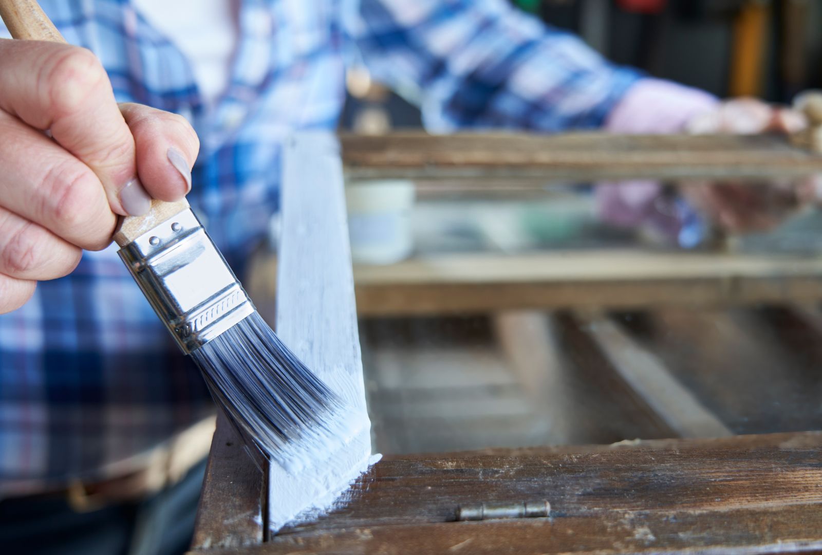 Close Up Of Woman Upcycling Furniture At Home, Painting Cabinet