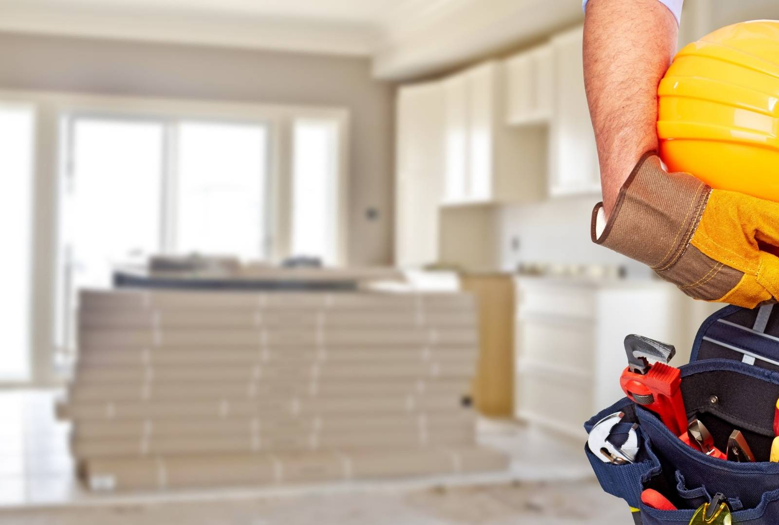 builder handyman with construction tools