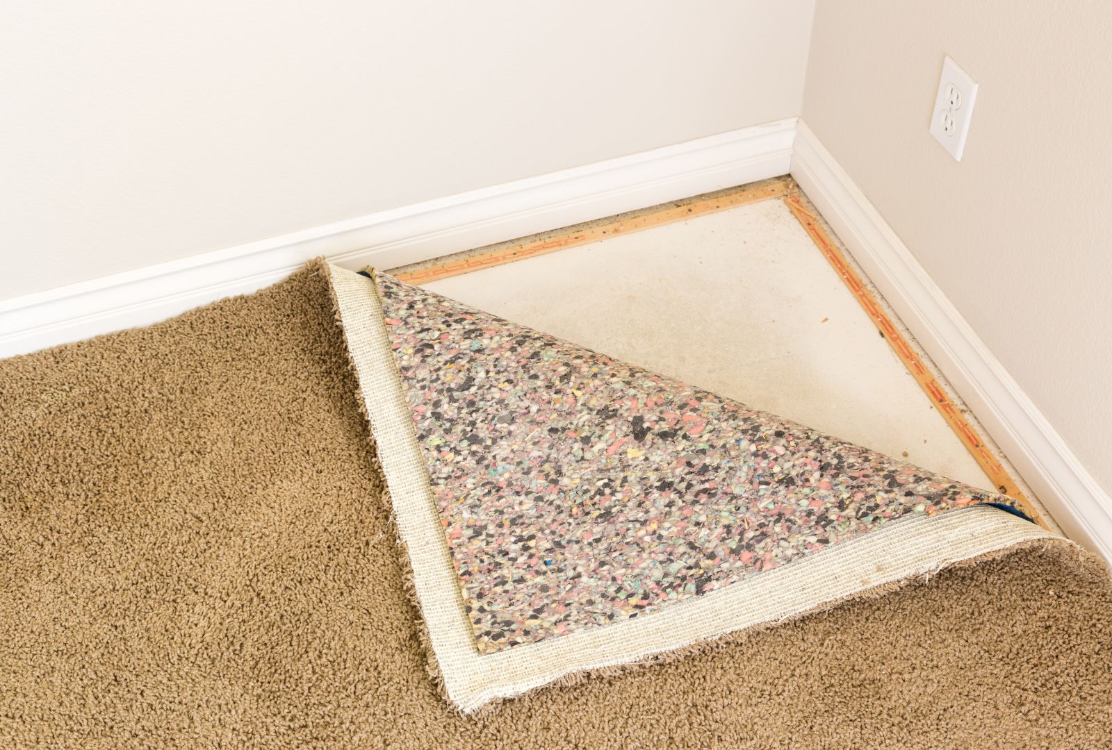 Pulled Back Carpet and Padding