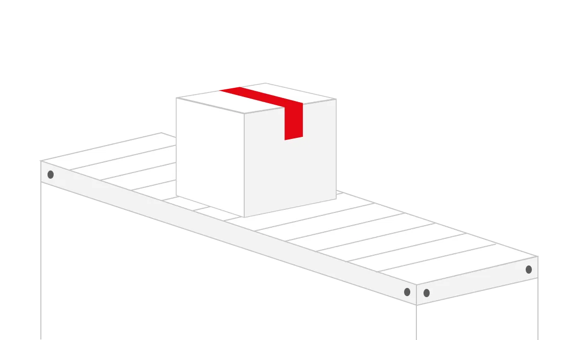 White cardboard box with red tape on a white conveyor belt.