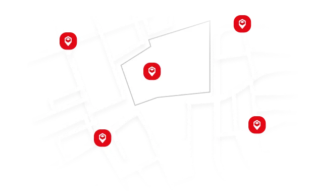Simplified city map with five red location pins marking different spots along black streets on a white background.
