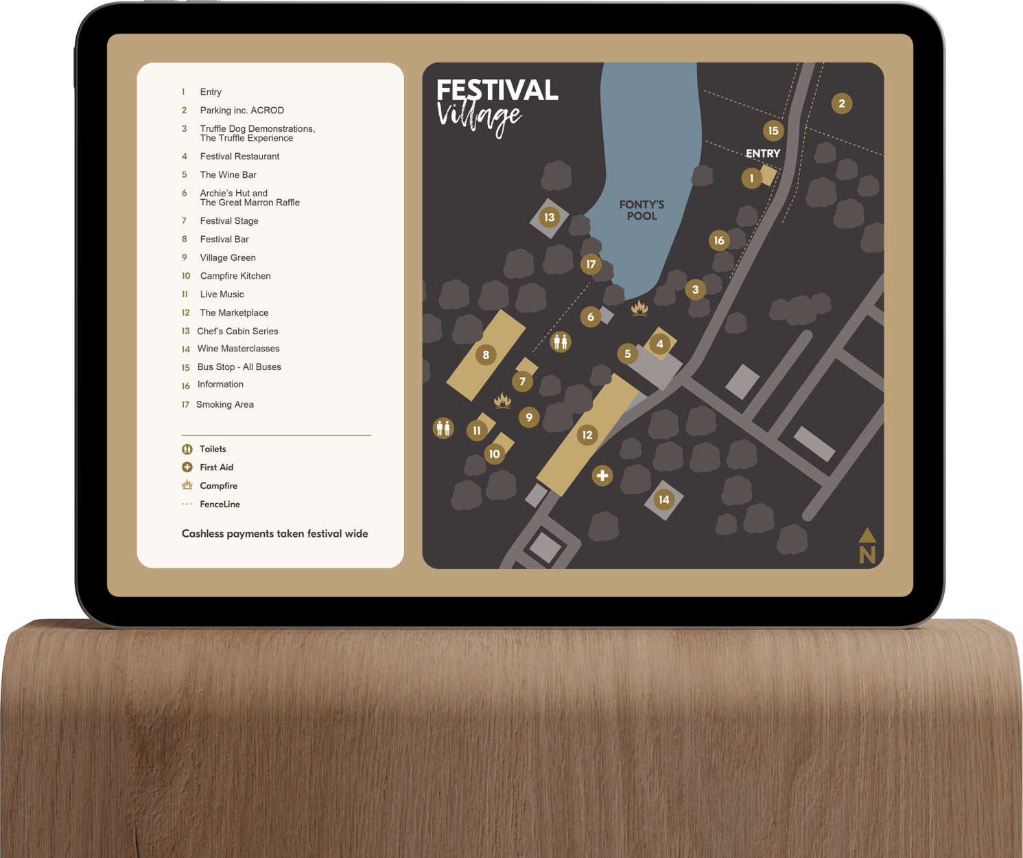 A map of a "Festival Village" on a tablet, including various locations and amenities.