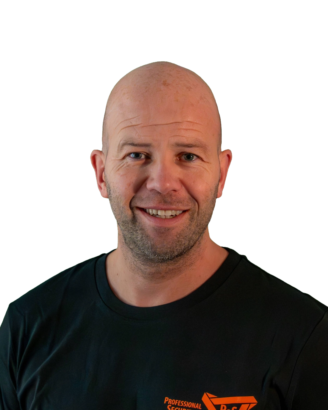 Smiling bald man with a short beard wearing a black t-shirt with an orange logo.