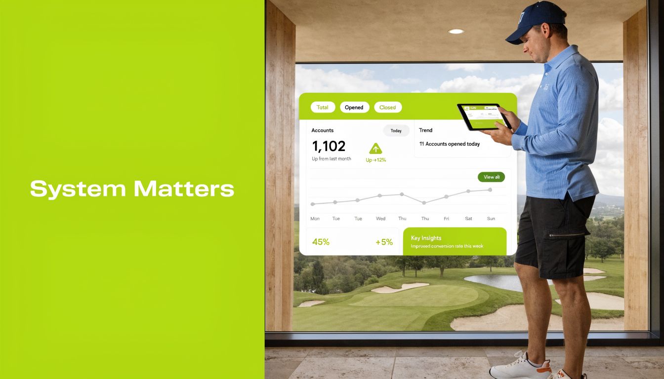A man in golf attire checking a digital dashboard showing account statistics while standing on a golf course.