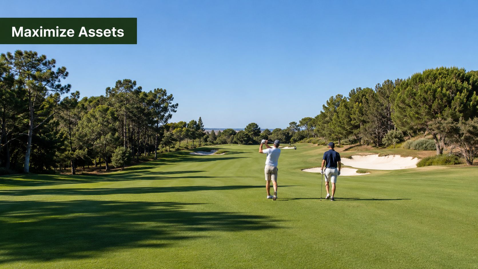 Two golfers walking down a lush green fairway on a sunny day at a golf course.
