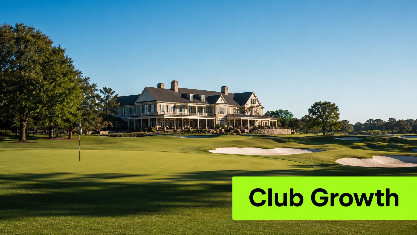 A scenic view of a large clubhouse overlooking a well-manicured golf course on a sunny day.