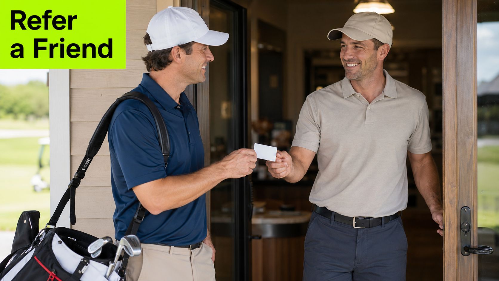 A golfer in a blue shirt handing a business card to a man standing in a doorway.