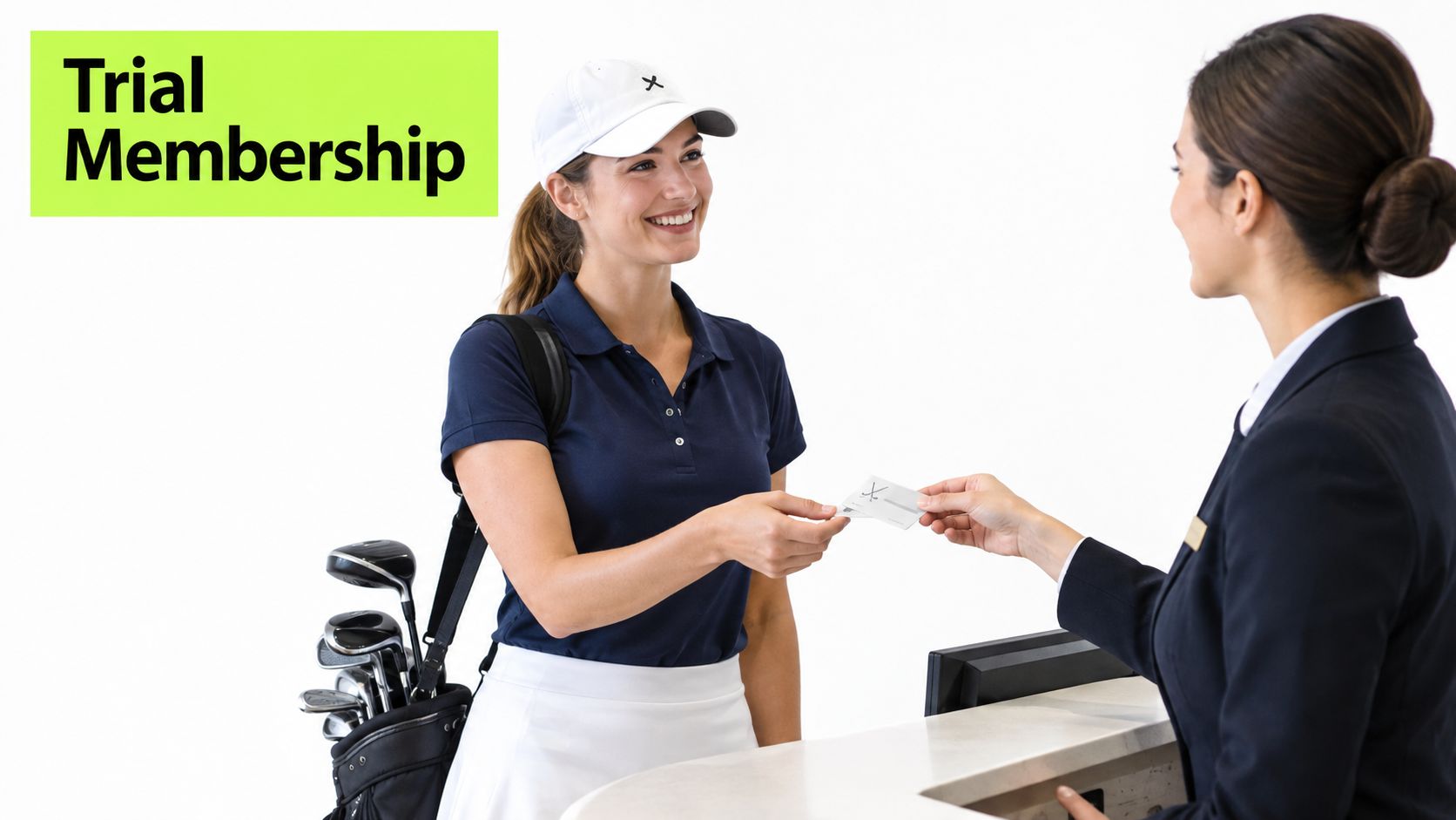 A golfer smiling while checking in and receiving a membership card at a golf club reception desk.