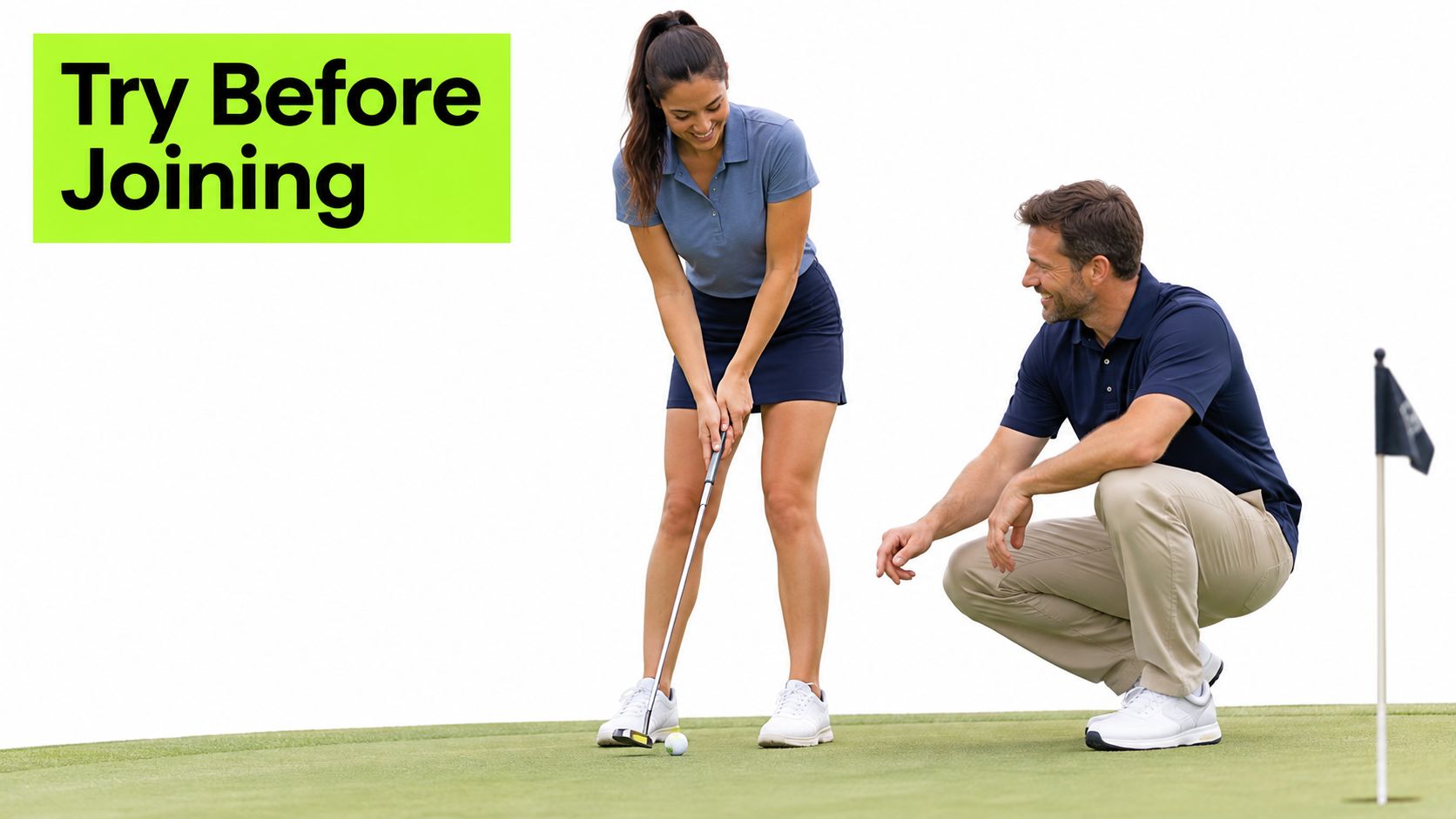 A professional golf instructor kneeling down to advise a woman while she practices putting on a green.