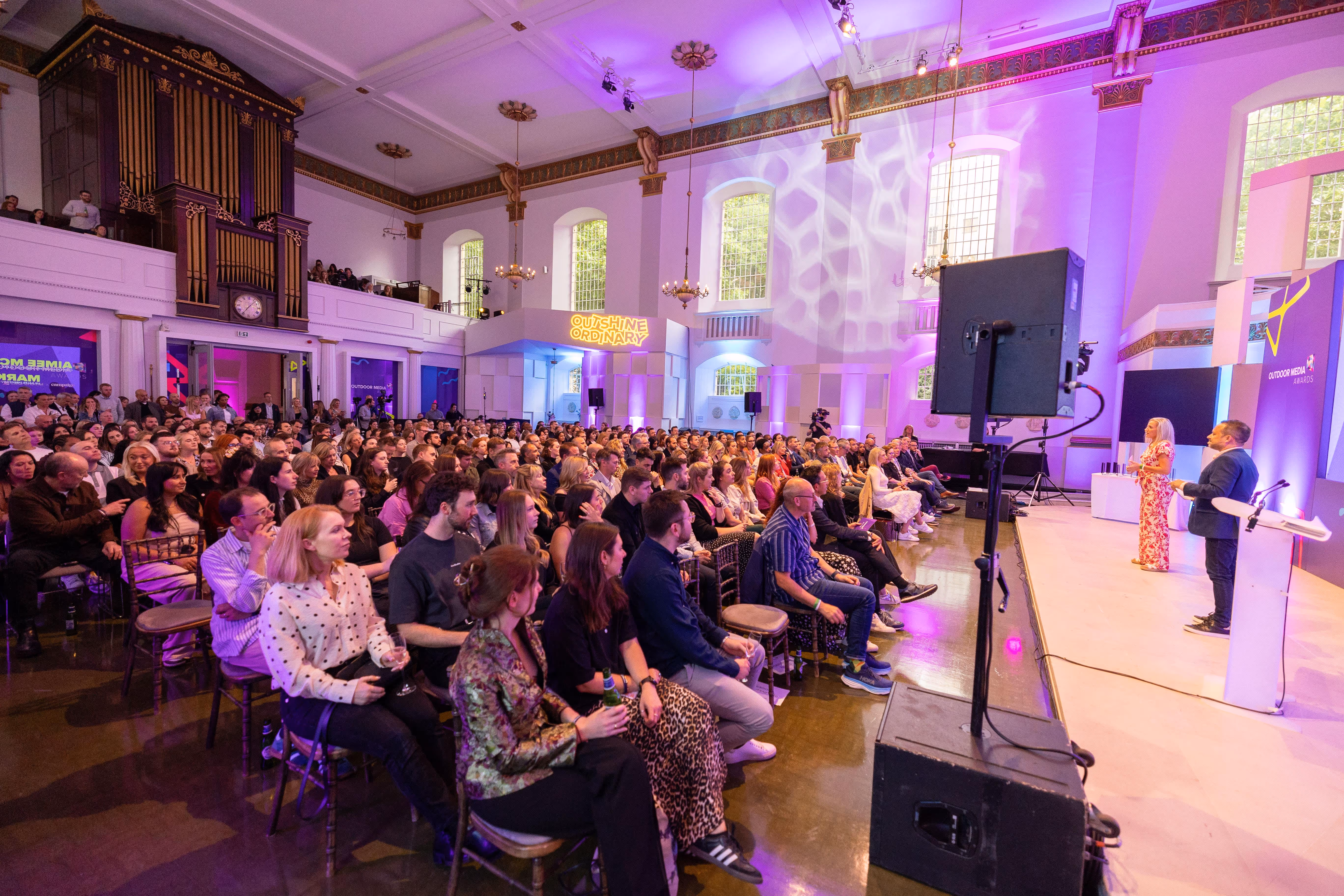 The audience at the 2023 Outdoor Media Awards, watching the presenters on stage