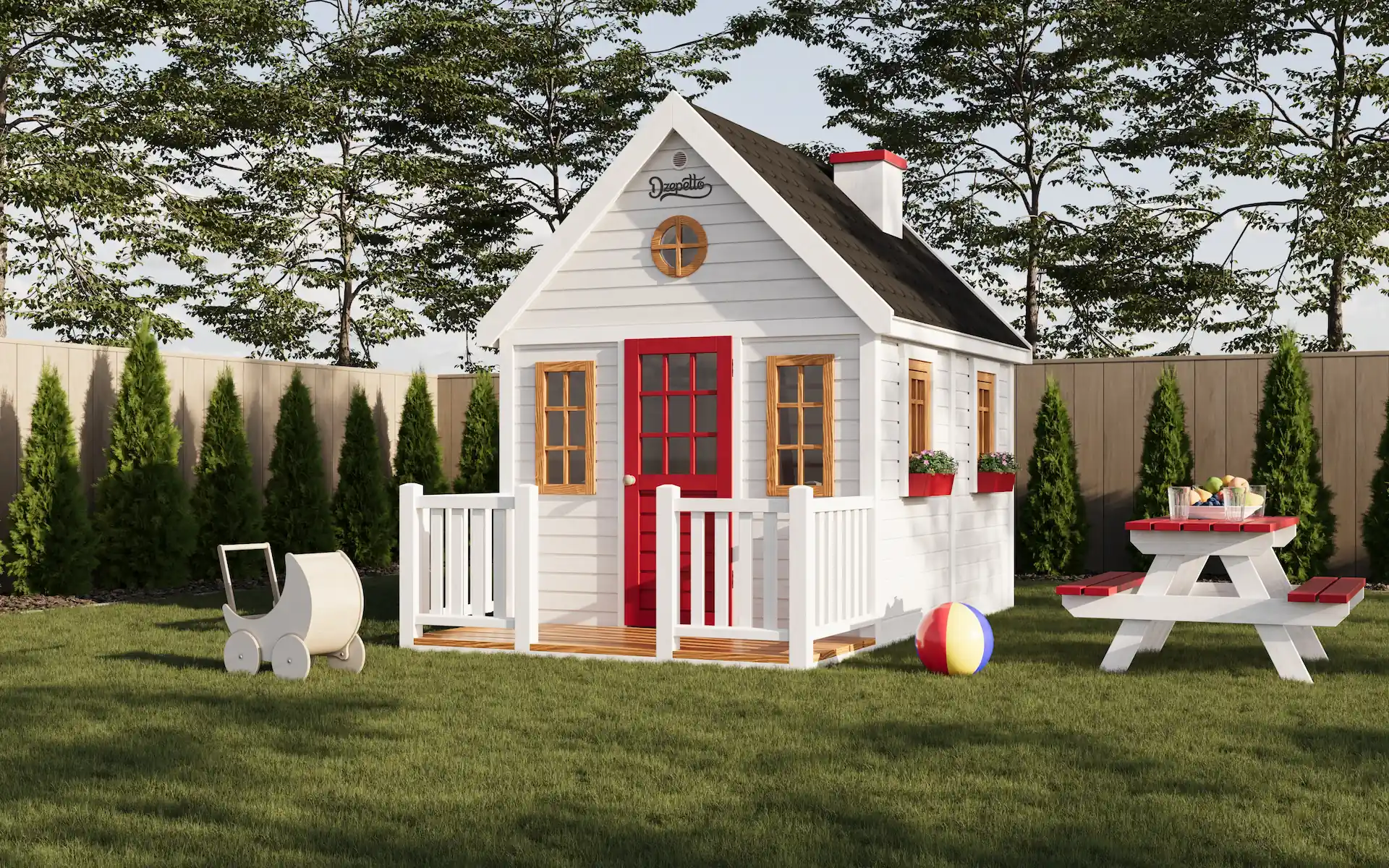 Visualization of small white playhouse with red door and wooden window frames on green lawn, surrounded by trees and a fence, alongside a red and white picnic table and colorful beach ball.