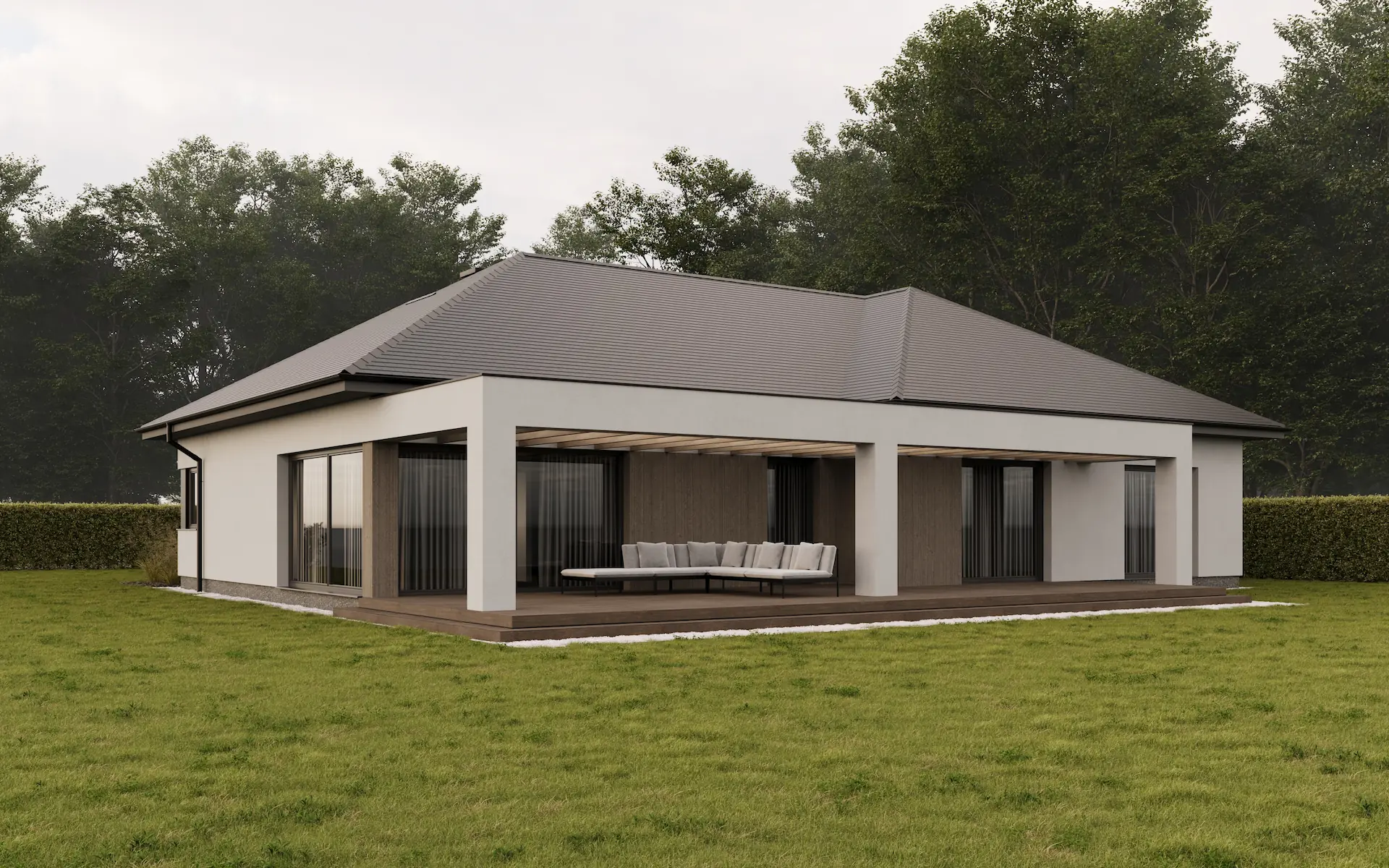 Visualization of modern single-story house with dark gray sloped roof, white walls, and a covered wooden patio with an outdoor sectional sofa, surrounded by green lawn and trees.
