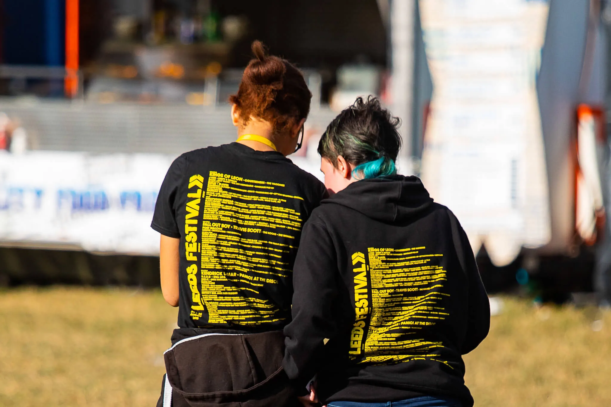 Two women wearing Leeds t-shirts.
