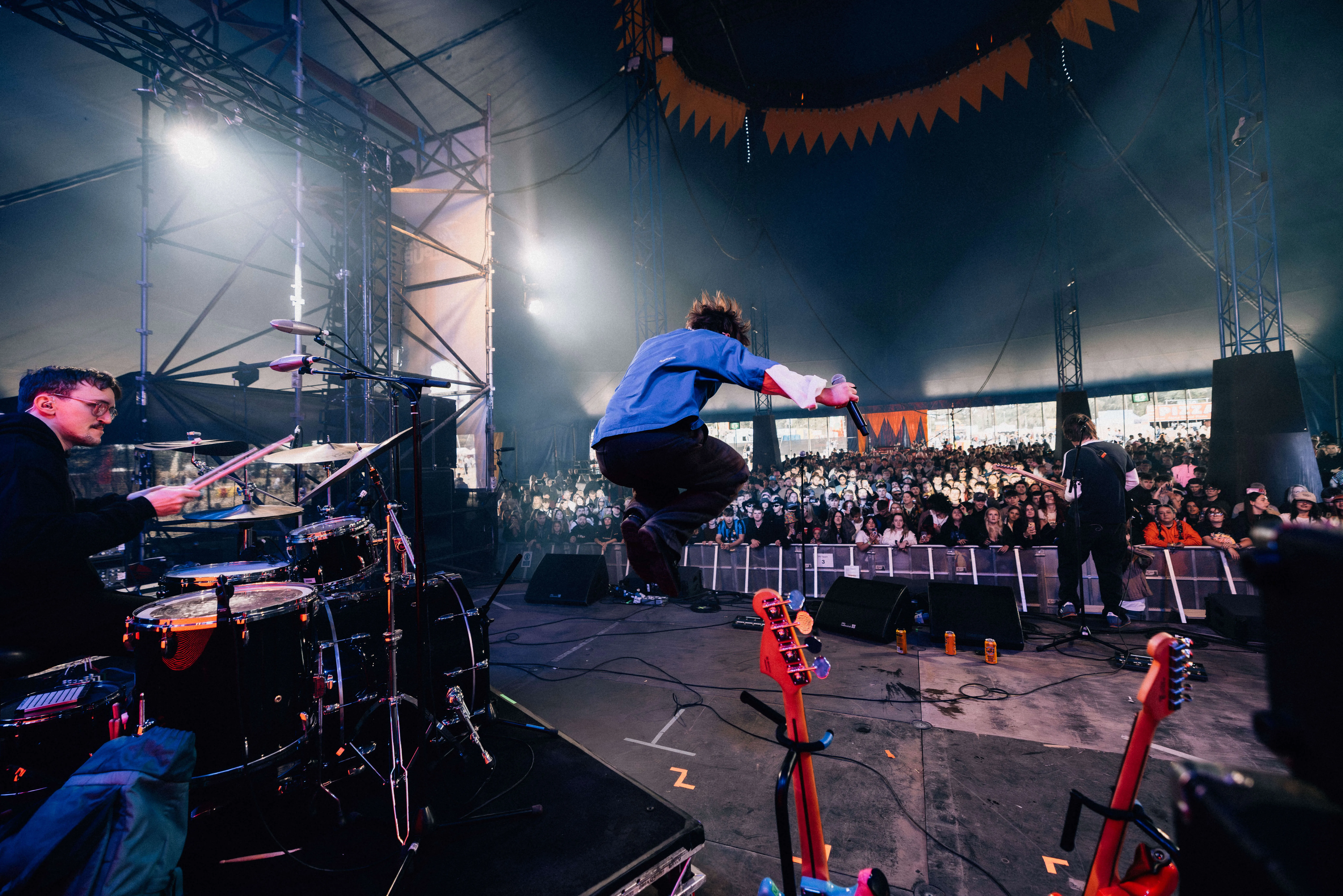 People constructing a festival stage.