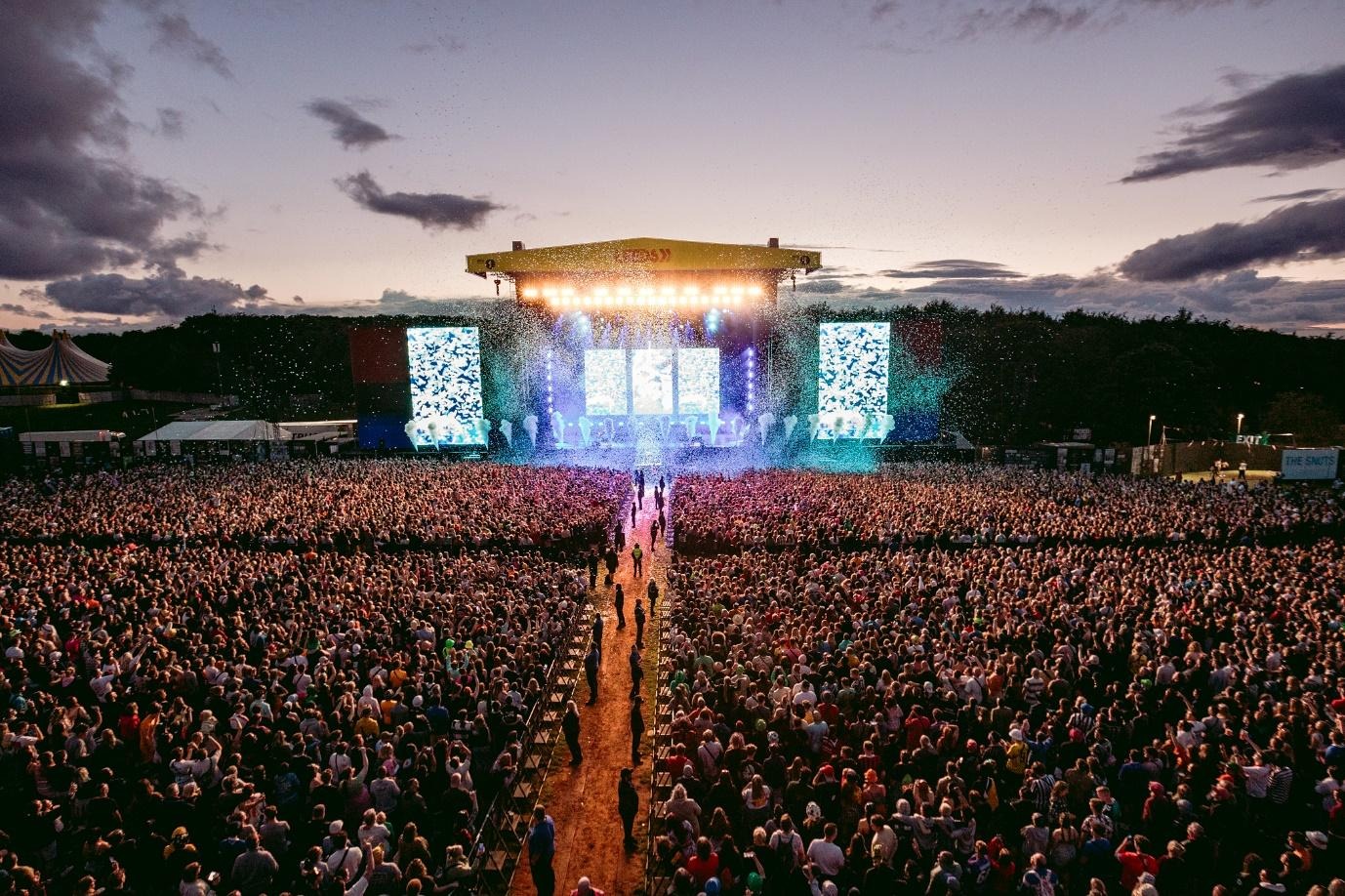 The main stage at Leeds festival where the crowd is watching a performance.