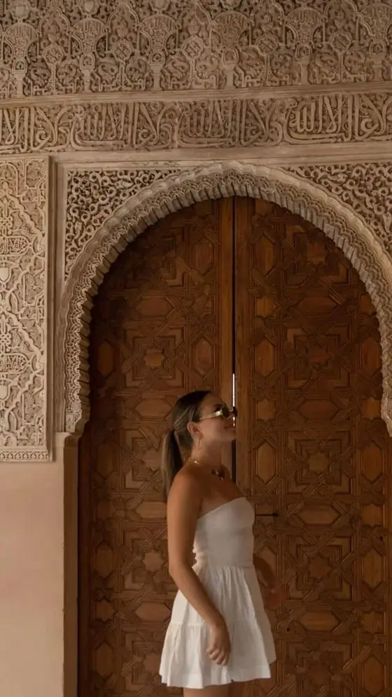 Sydney Duleba in a carved doorway in Granada