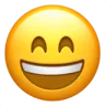 Smiling yellow emoji face with closed eyes and broad open mouth.