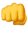 Yellow emoji of a clenched fist pointing forward.