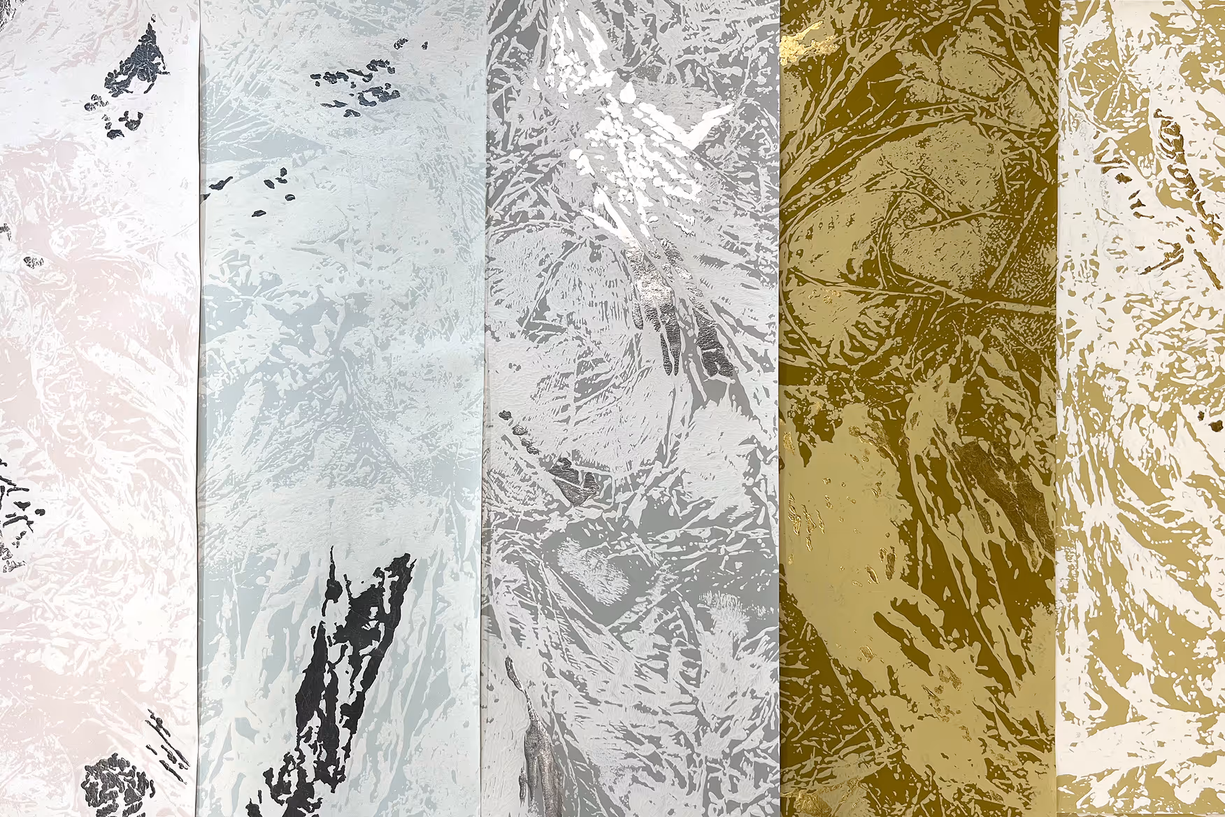 Close-up of five vertical panels with abstract textured patterns in white, gray, black, and gold tones.