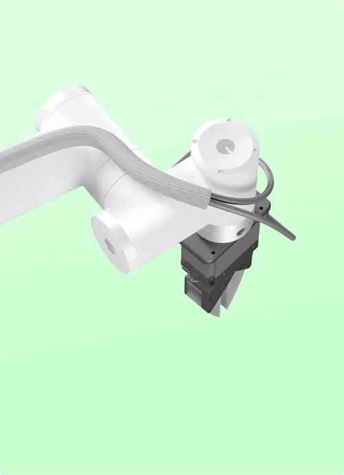 Close-up of a white robotic arm with attached cables and a black mechanical gripper against a light green background.
