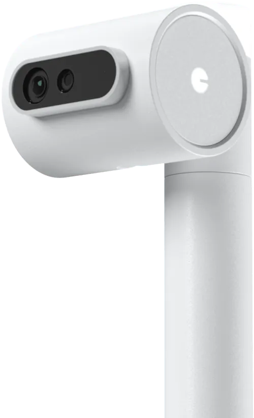 White handheld device with two circular sensors on the front and a circular button on the side.