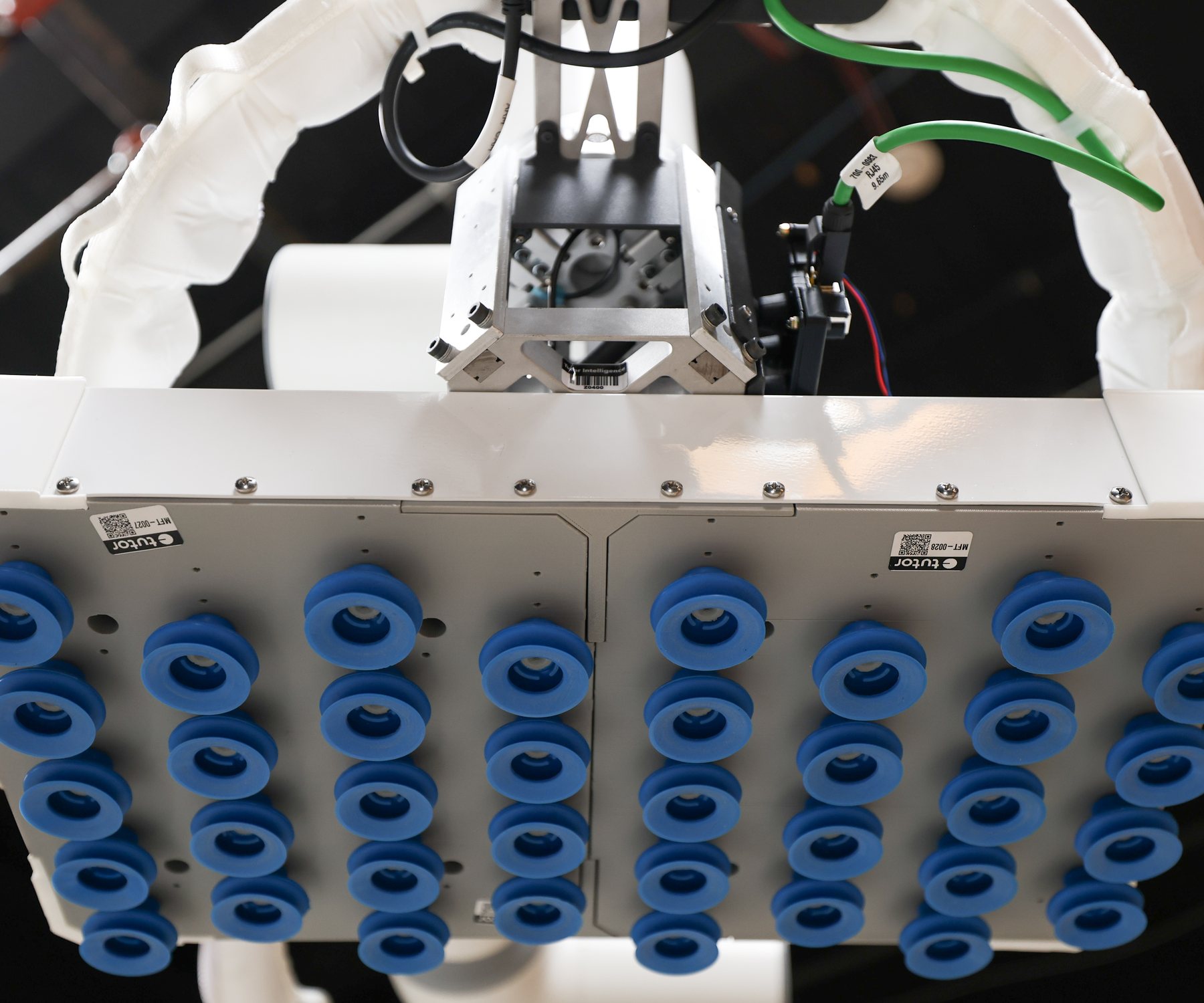 Underside of Cassie's vacuum gripper, showing its array of blue suction cups.