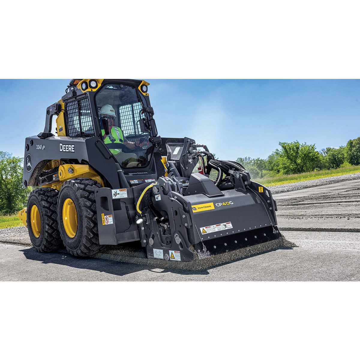 334 P-Tier skid steer with CP40G cold planer attachment.