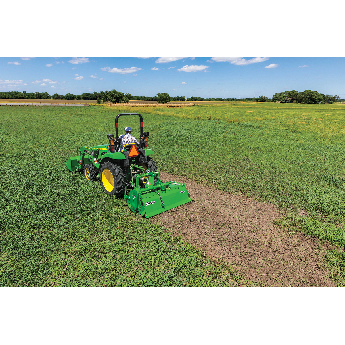 Field view of the RT3062 Rotary Tiller on a Compact Utility Tractor
