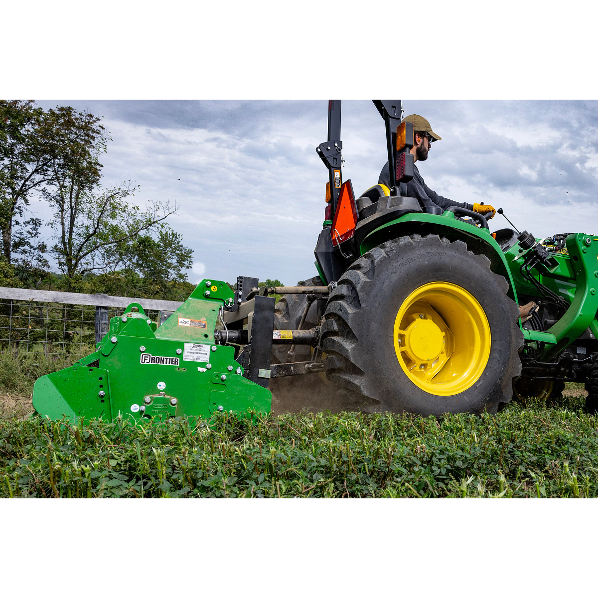 RT3062 Rotary Tiller on 3025E Tractor in a field
