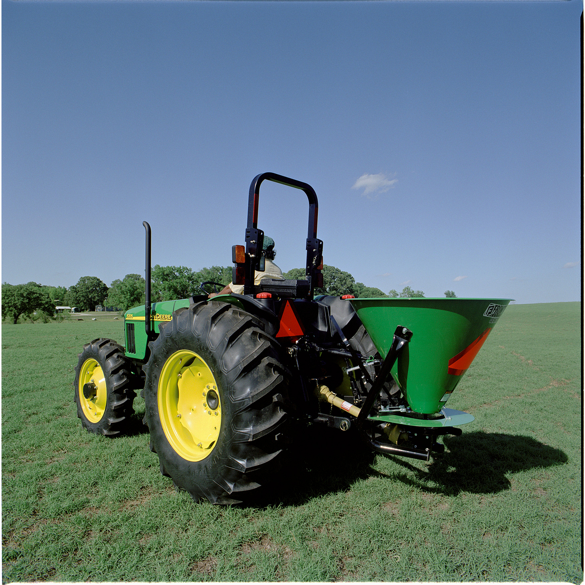 SS1067B on 5 series tractor in field