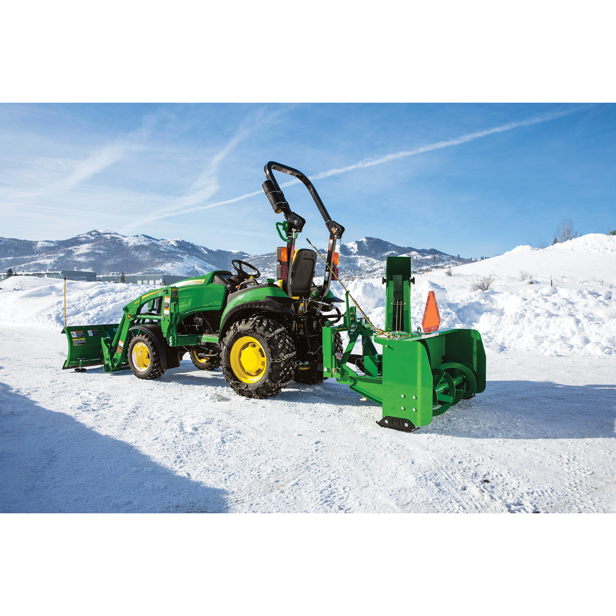 SB1154 Snowblower on 2025R Tractor on a snowy driveway