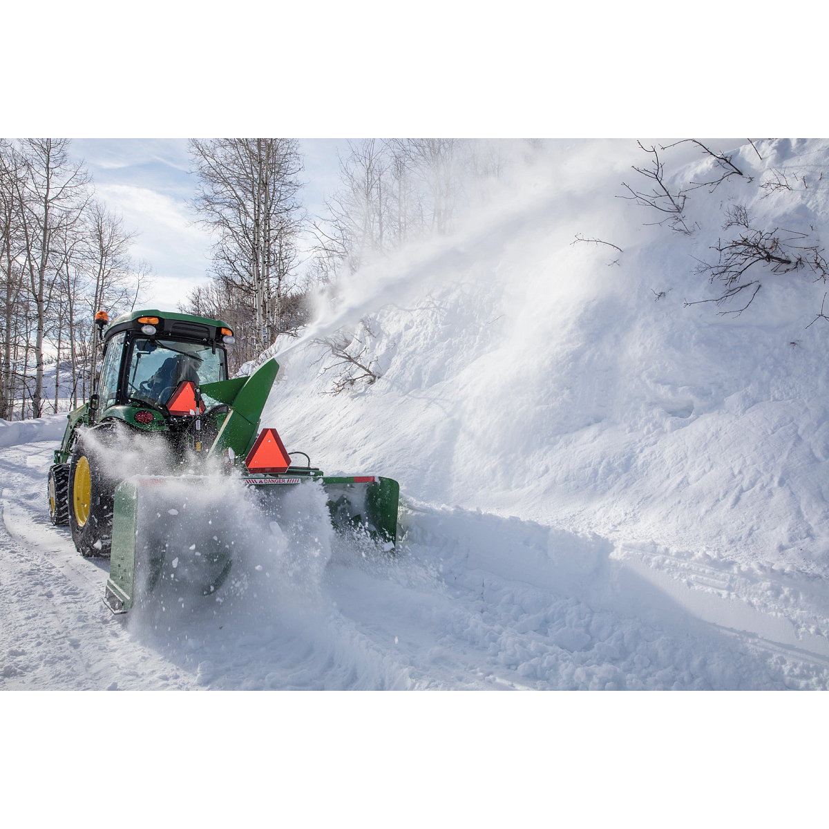 Blowing snow using a SB1184 Snowblower on 4066R Tractor
