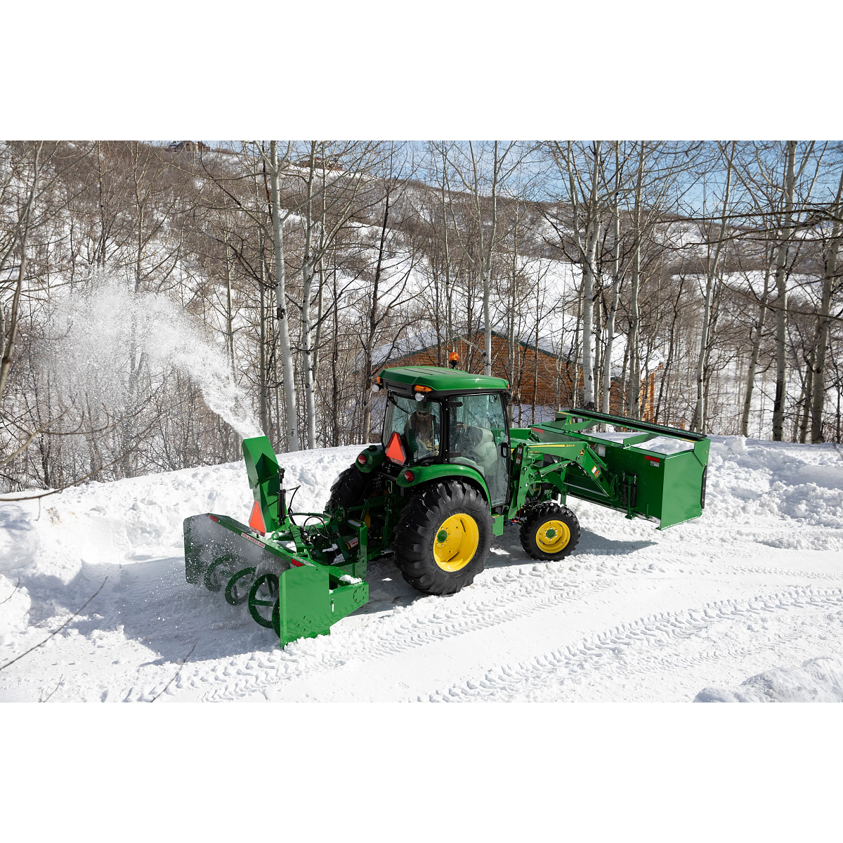 Blowing snow using a SB1184 Snowblower on 4066R Tractor