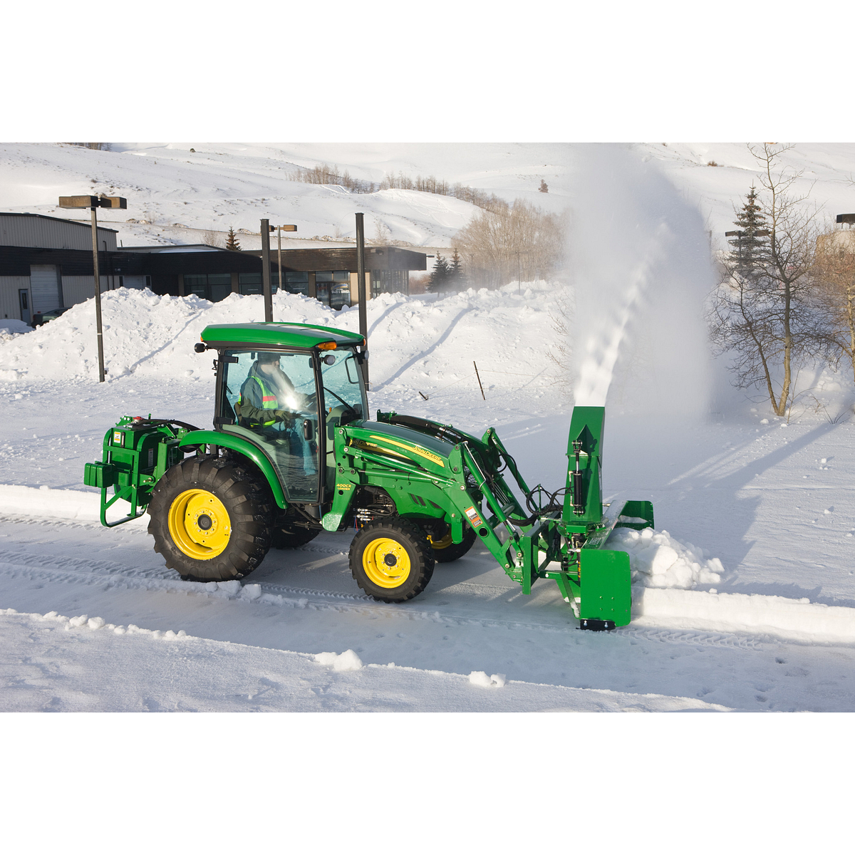 Blowing snow using a SB2176 Snowblower on a utility tractor