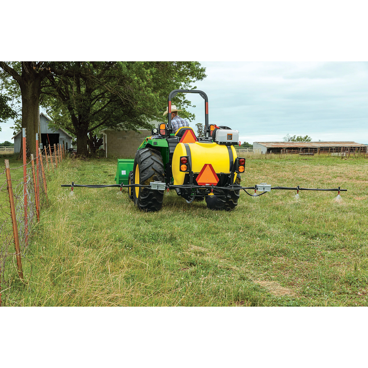 Field view of LS2011 Sprayer on 4066M Tractor in field