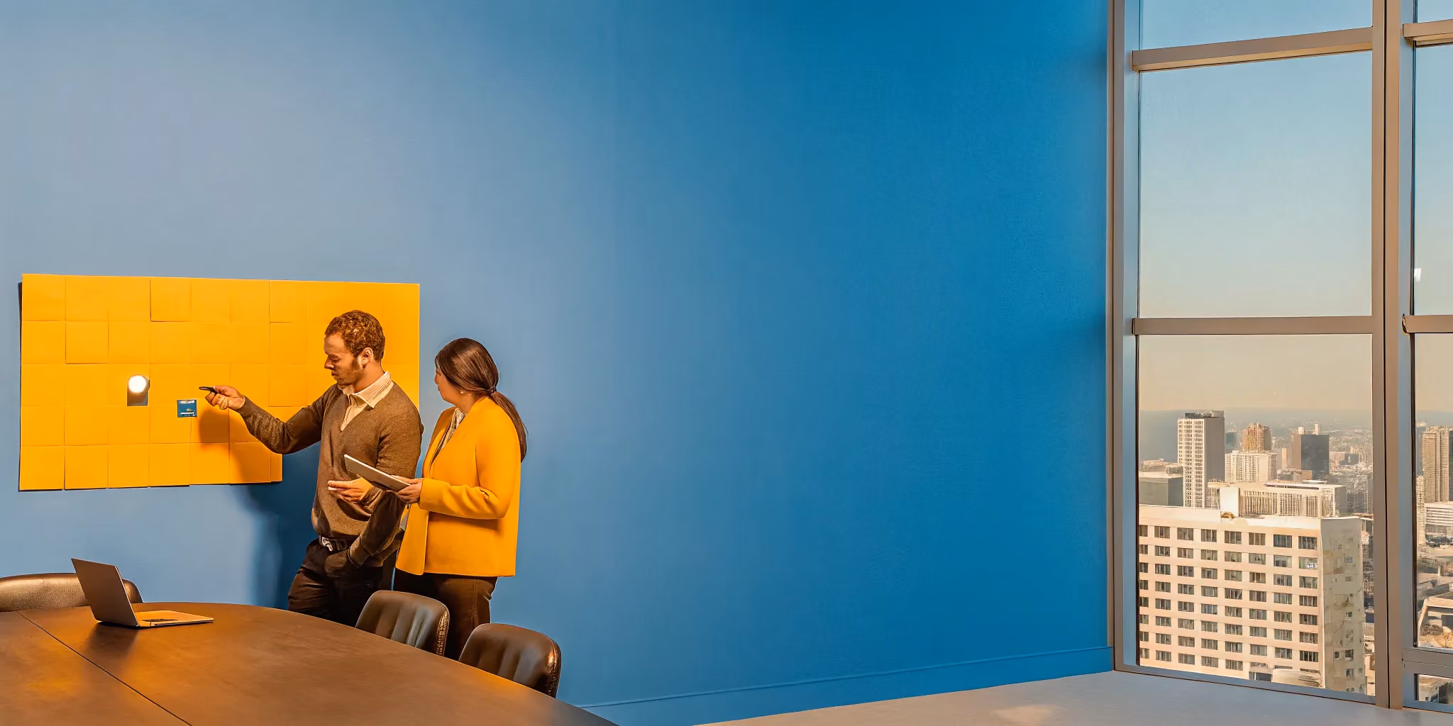 A project management consultant discussing project strategy with a client.