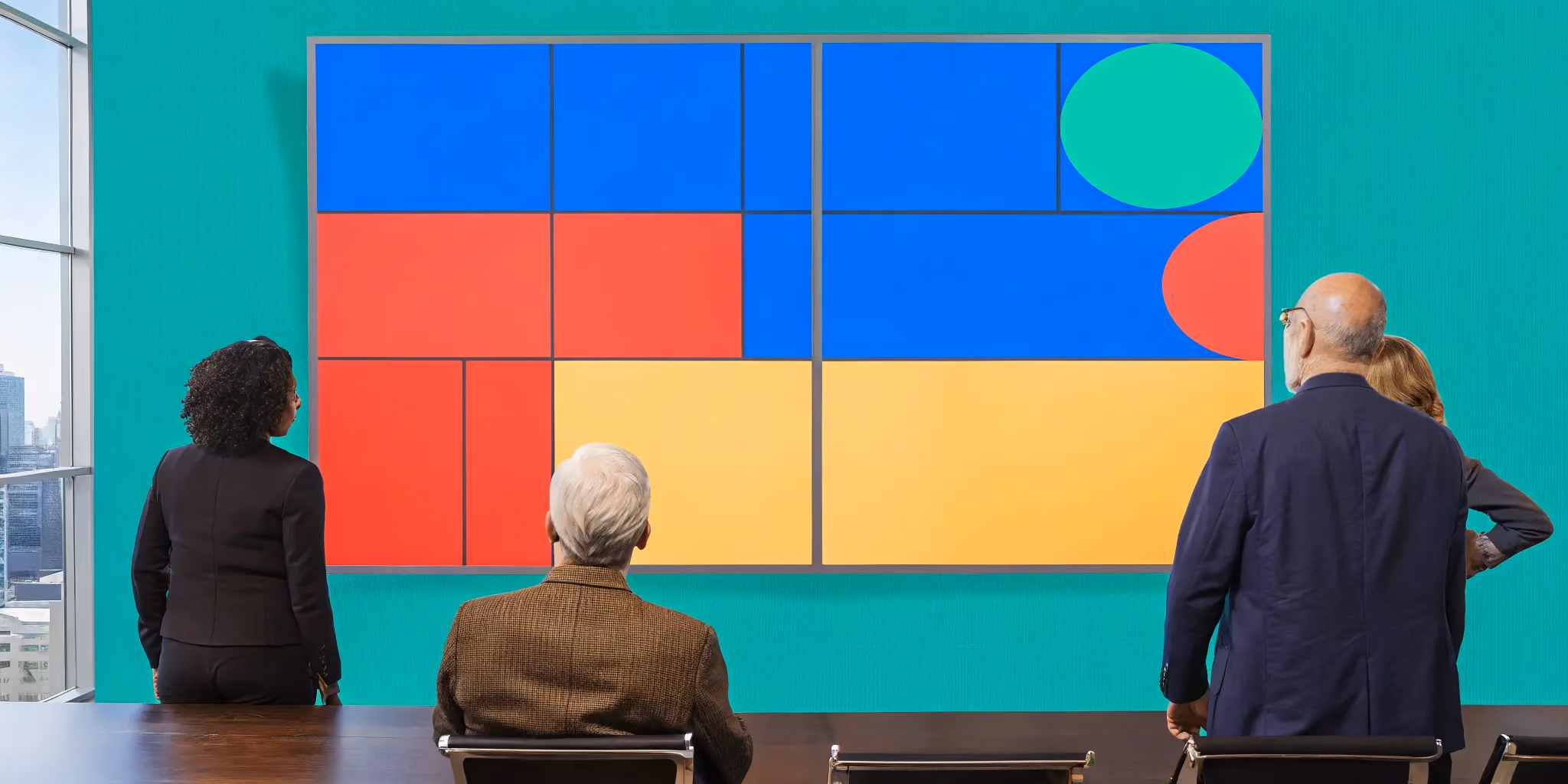 Executives reviewing a PMO consulting services strategy board.