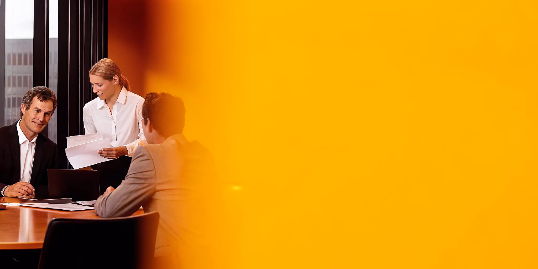 Private equity and portfolio company executives reviewing a value creation roadmap together