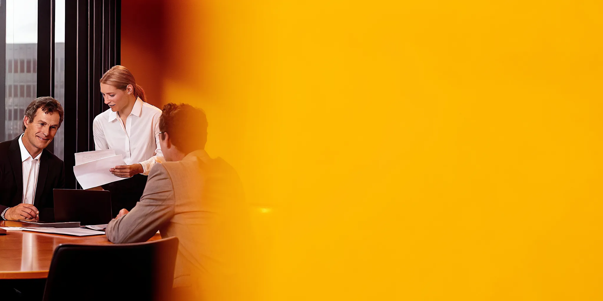 Private equity and portfolio company executives reviewing a value creation roadmap together