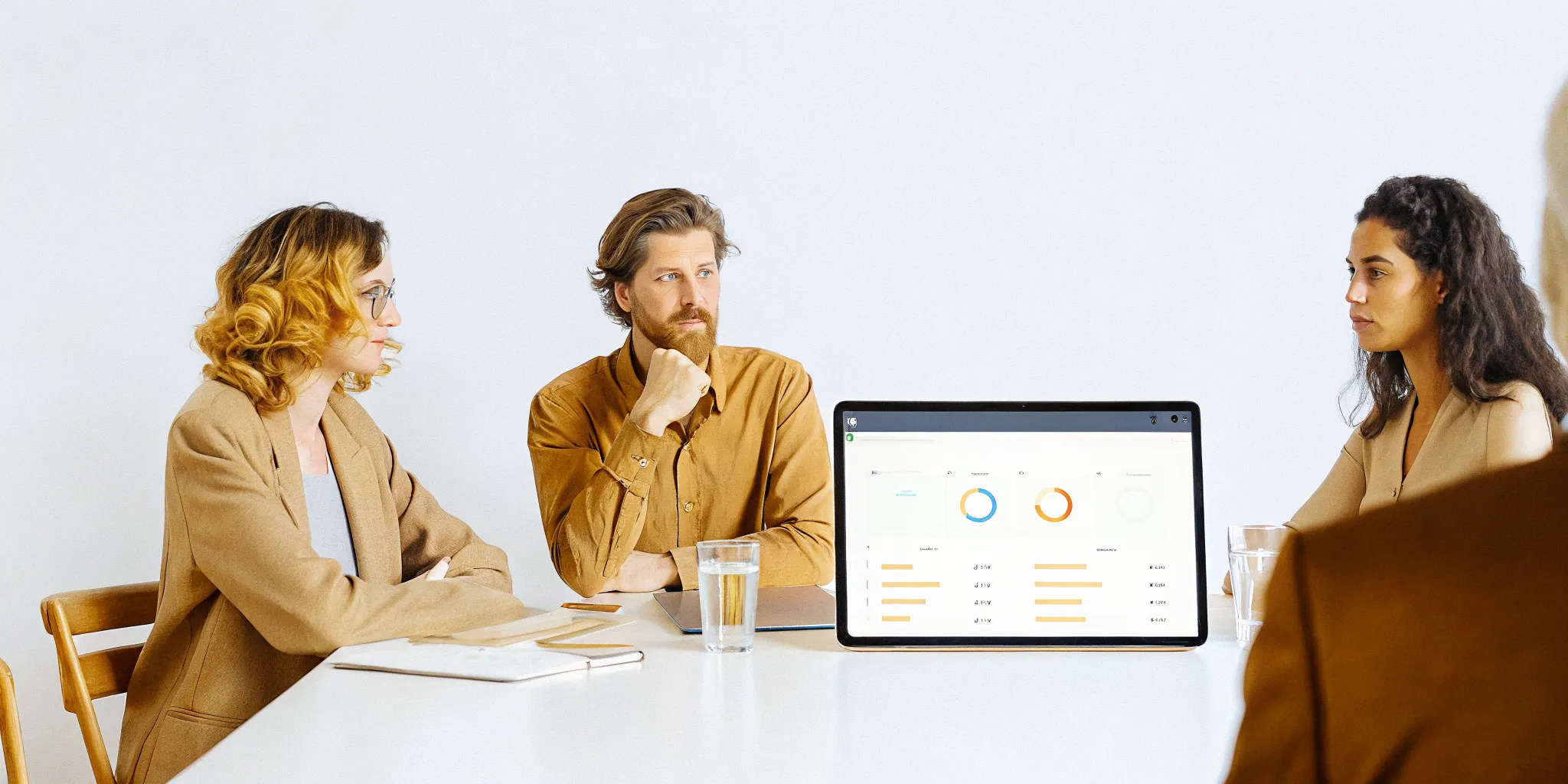 Executives comparing PMO consulting and internal PMO options