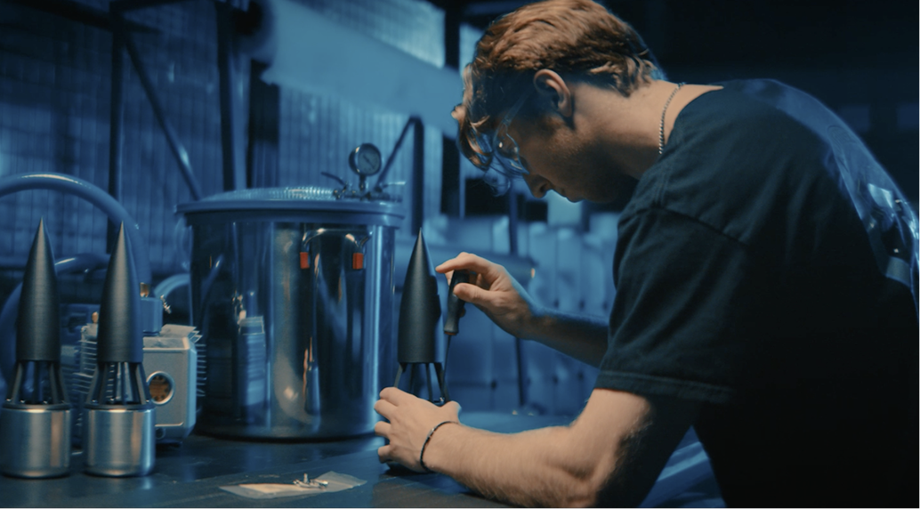 man building a rocket