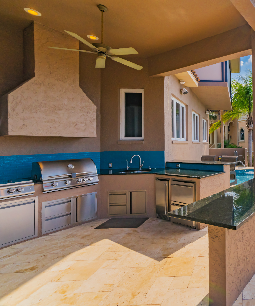 Pool remodel and outdoor kitchen upgrade by South Shore Pools — before and after in South Shore FL